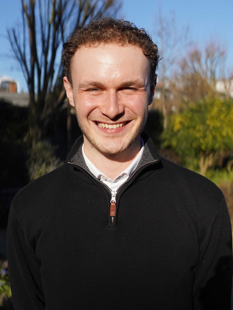 Dan Kitchen, Graduate Sustainability Consultant in front of the Shard.
