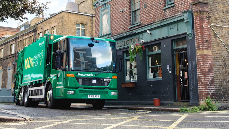 Award winning waste management service Recorra RCV vehicle outside a local pub 'The Gladstone'.